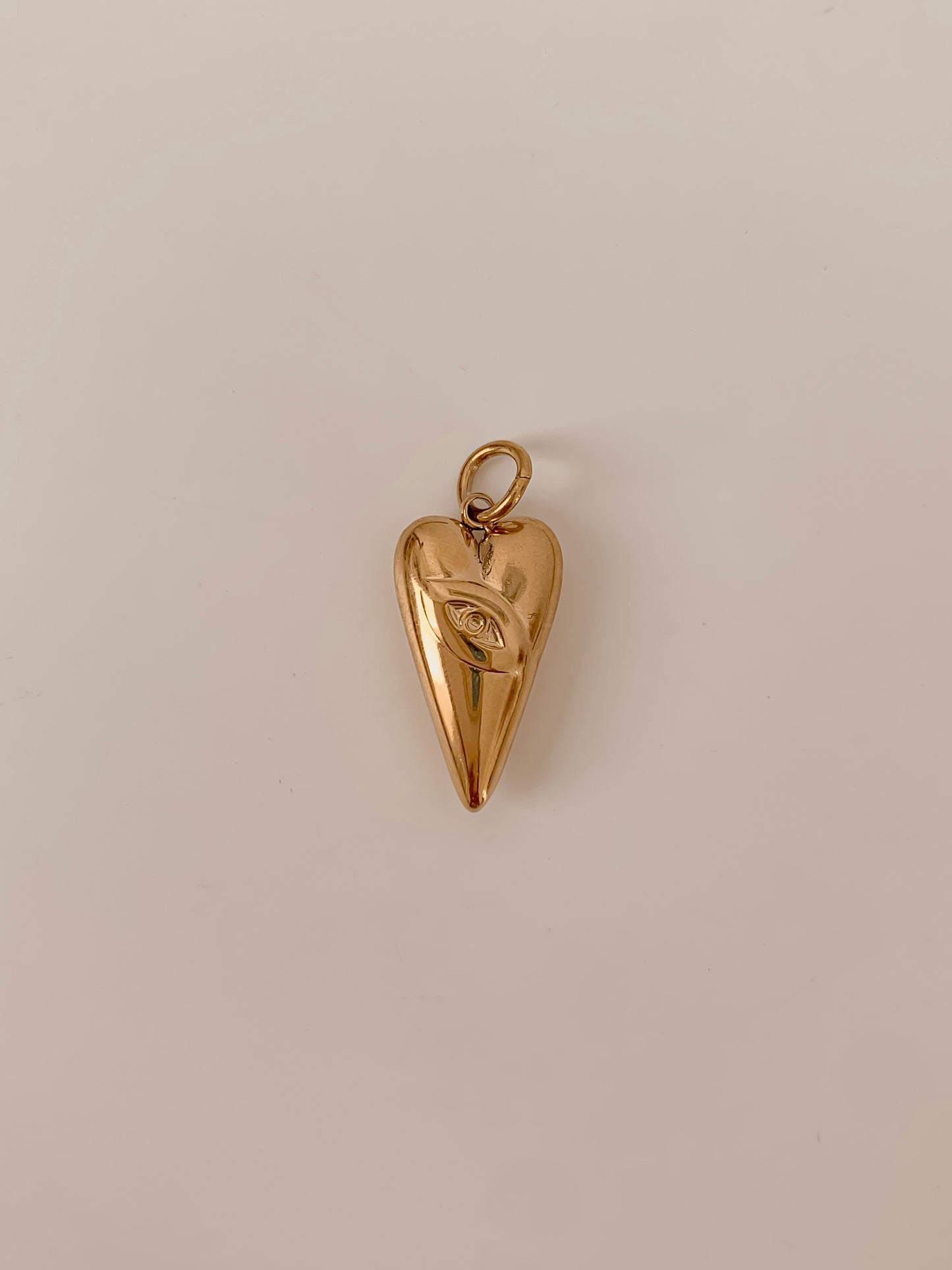 Ojo del Corazon Charm