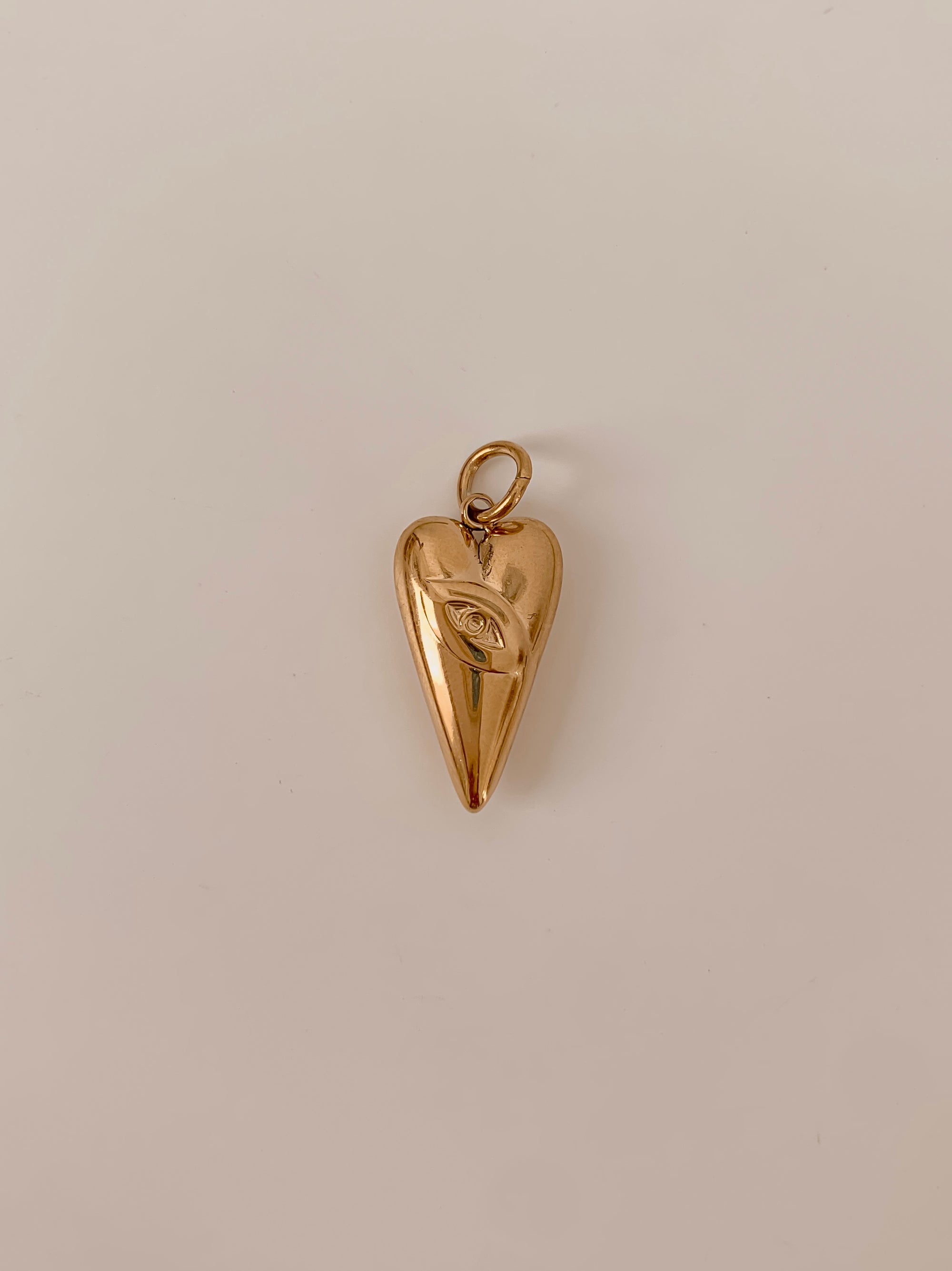 Ojo del Corazon Charm